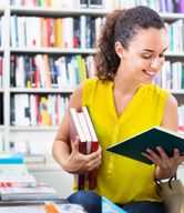 Woman browsing in a bookstore.